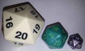 The d20 on the left is about the size of a baseball; the right-hand d20 is regualr size.